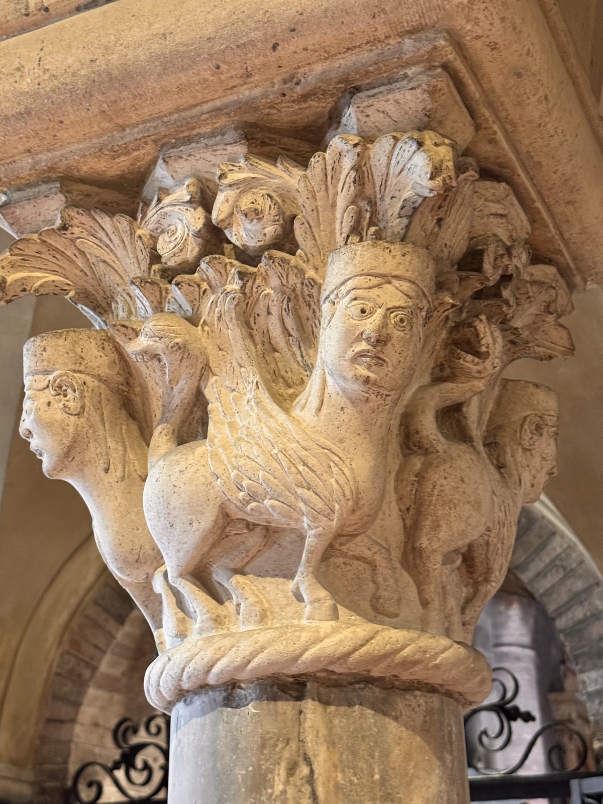 Crowned birds with human heads emerge from acanthus leaves: harpies or sirens, creatures of the boundary between heaven and earth